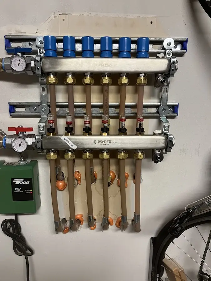 Plumber performing Gas Line Installation at a residential property in Addison